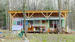 A frontal view of our work in progress. As the summer moves forward we will be making more improvements and creating more and more beautiful artwork, cleaning up the land and planting more flowers and trees, We may even stock our little ponds with fish!