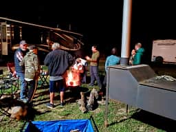 Campers enjoying our fire pit on a cold evening.