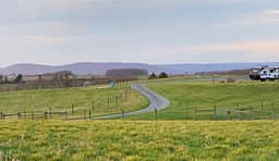 A clear view of the mountains and the campsite from one of the cattle pastures.