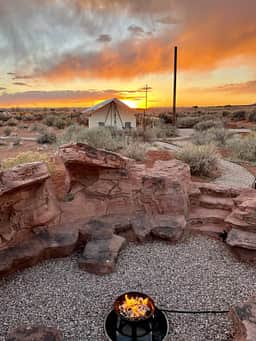 Our unique red-rock firepit is located at the center of the site for all guests to enjoy. Pictured here is Pancho's Villa