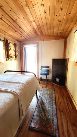 Cabin interior. One full size bed. 